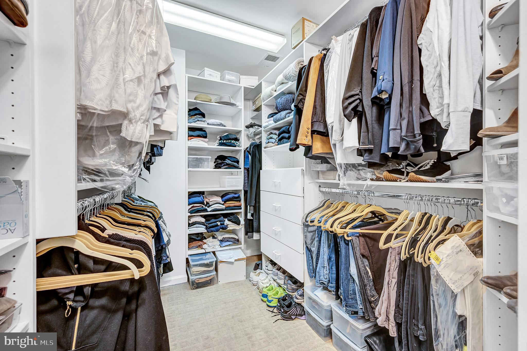 10918 Bells Ridge Drive Potomac, MD 20854 - Photo 27 of 41 a view of walk in closet with clothes and shoes