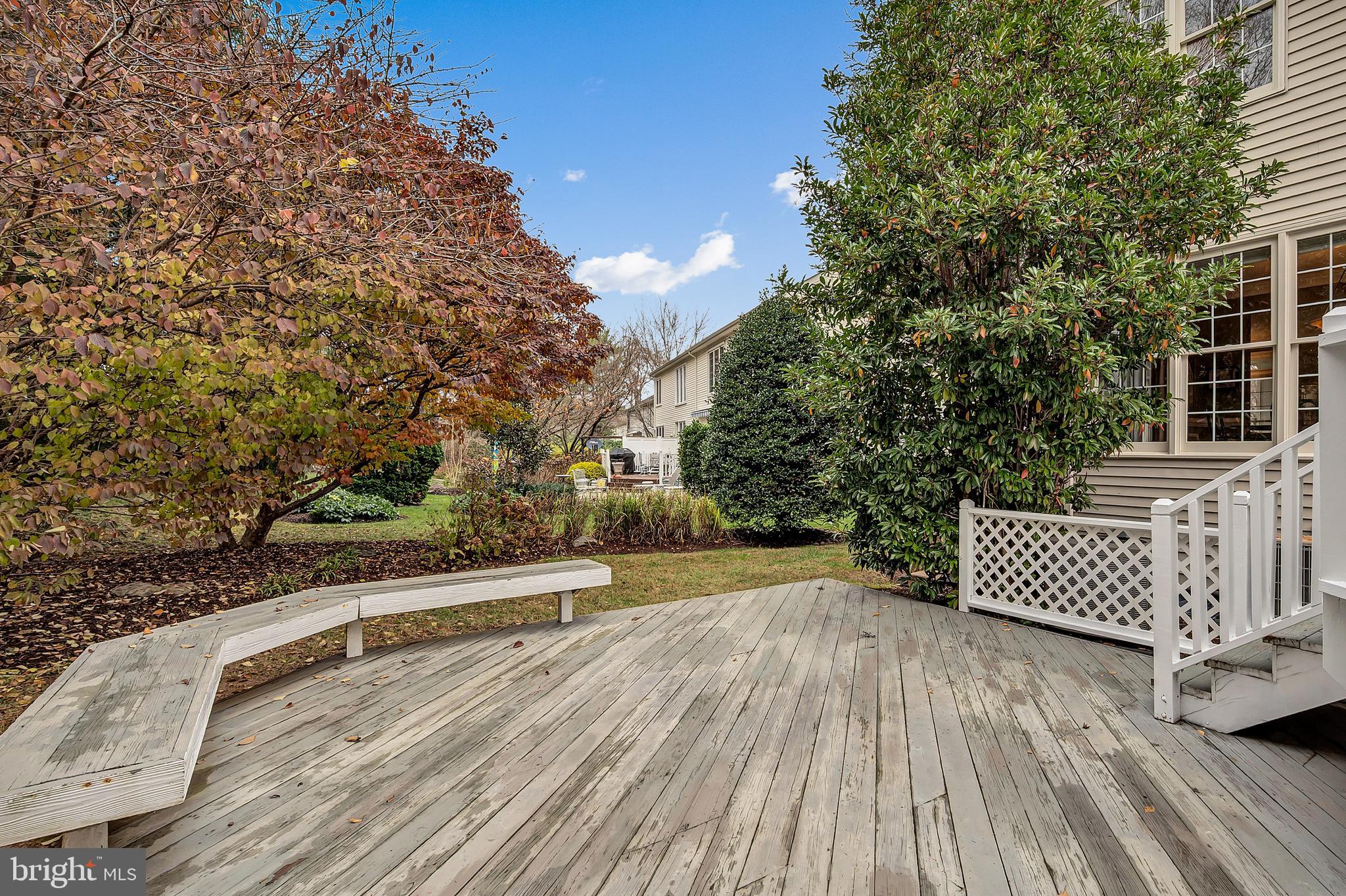 10918 Bells Ridge Drive Potomac, MD 20854 - Photo 40 of 41 a view of a roof deck with wooden floor and fence