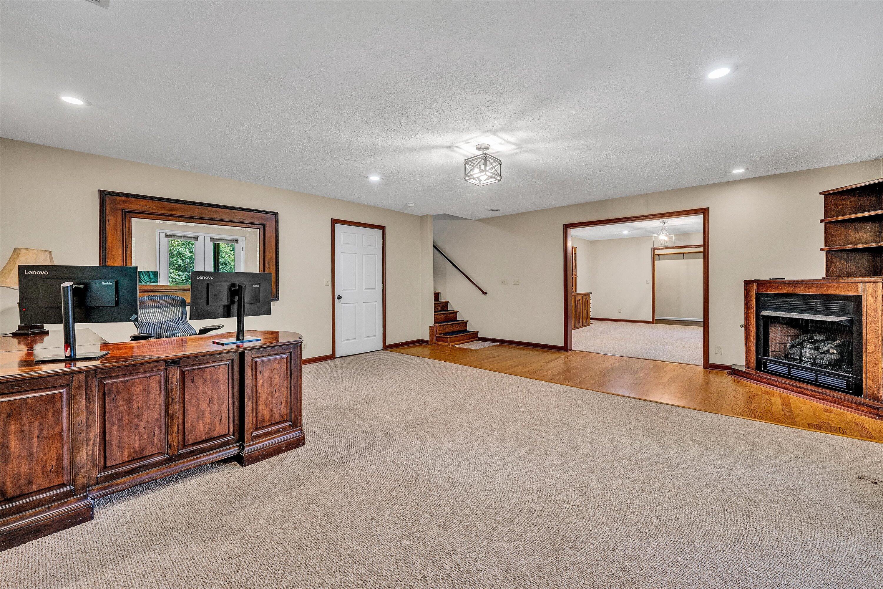 400 Harbor Moneta, VA 24121 - Photo 31 of 51 a living room with furniture and a fireplace