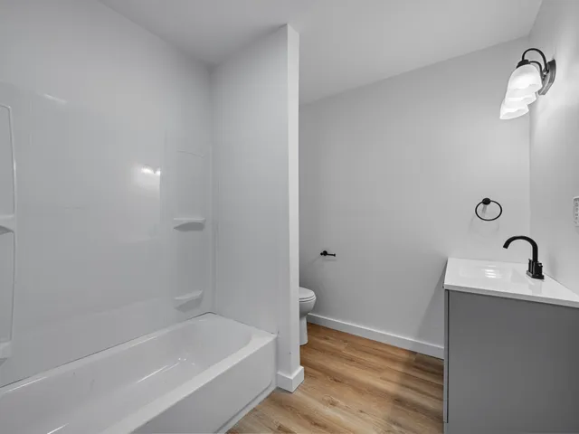 a bathroom with a sink and a bathtub