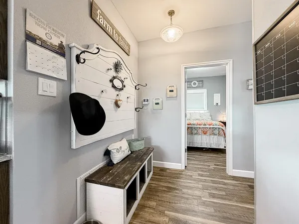 a bedroom with a bed and a view of bathroom