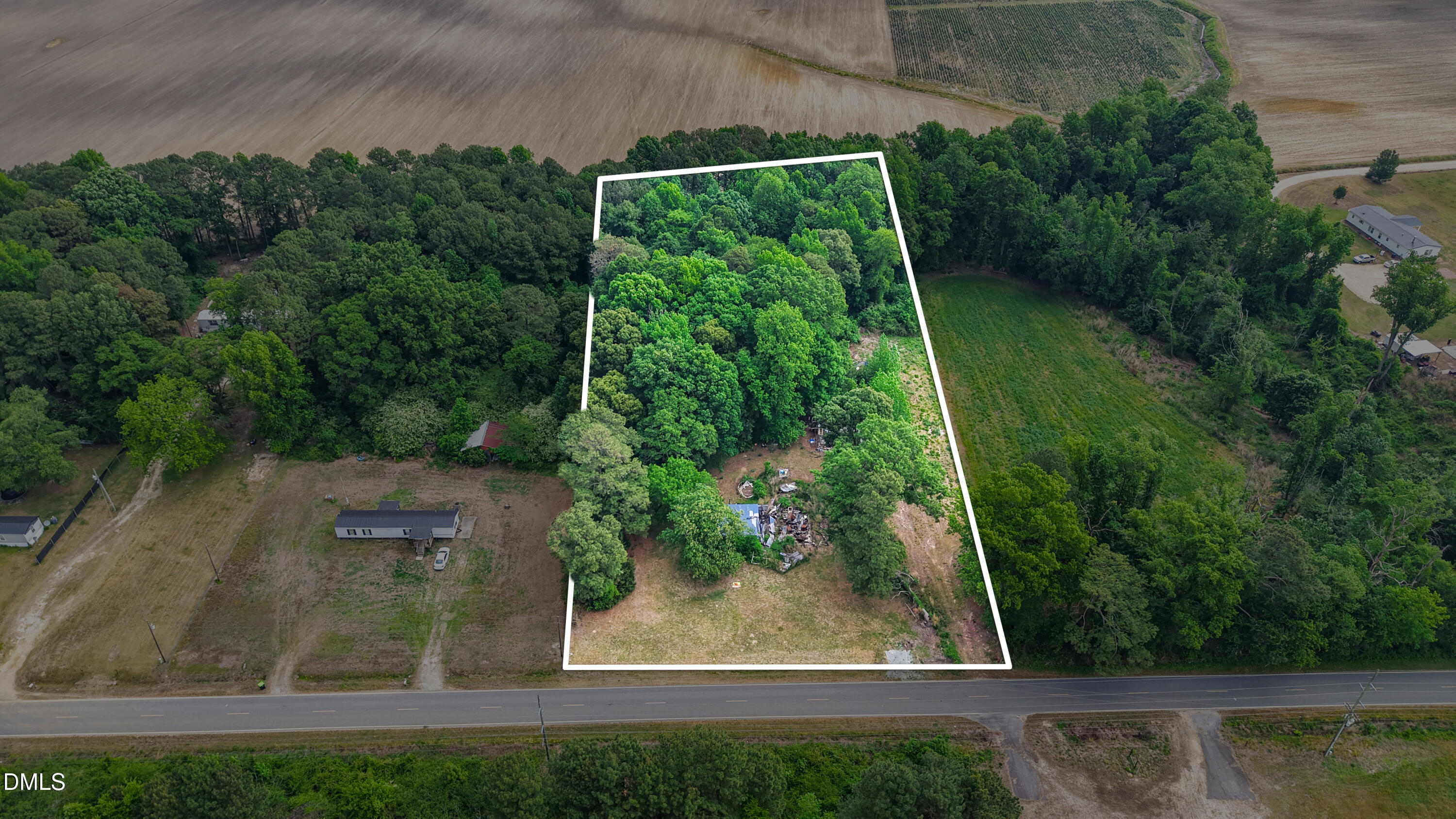 3237 East Darden Road Faison, NC 28341 - Photo 1 of 9 a view of a backyard