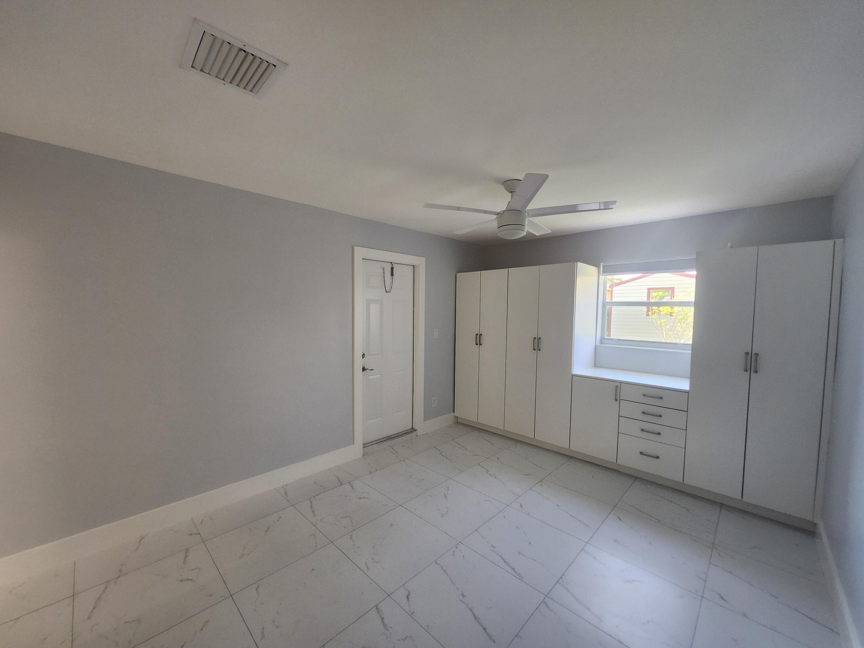 511 Northwest 60th Way, Unit EAST APARTMENT Hollywood, FL 33024 - Photo 9 of 15 a view of an empty room