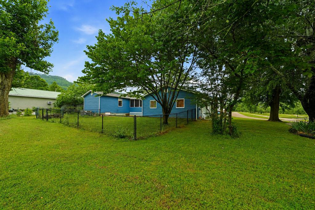 483 Allgood Road Flintstone, GA 30725 - Photo 31 of 34 a view of a house with a backyard