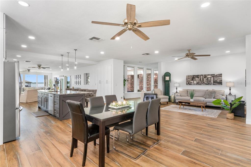 13830 Lake Mary Jane Road Orlando, FL 32832 - Photo 11 of 99 a view of a dining room with furniture window and wooden floor