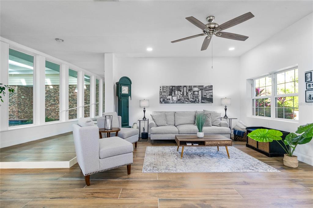 13830 Lake Mary Jane Road Orlando, FL 32832 - Photo 13 of 99 a living room with furniture and a large window