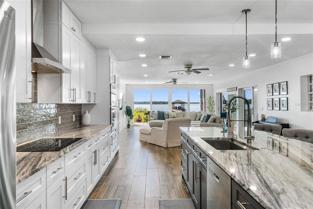 13830 Lake Mary Jane Road Orlando, FL 32832 - Photo 4 of 99 a kitchen with counter top space cabinets and appliances