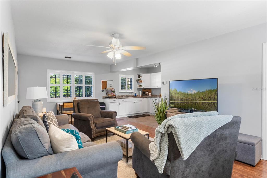 13830 Lake Mary Jane Road Orlando, FL 32832 - Photo 64 of 99 a living room with furniture and a large window