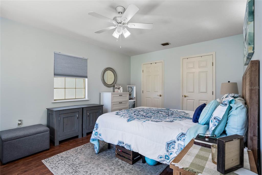 13830 Lake Mary Jane Road Orlando, FL 32832 - Photo 67 of 99 a living room with a bed furniture and a window