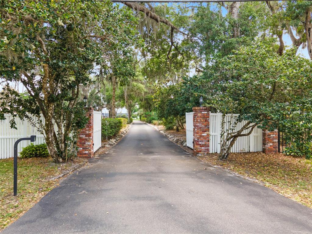 13830 Lake Mary Jane Road Orlando, FL 32832 - Photo 75 of 99 a view of a road with a building in the background