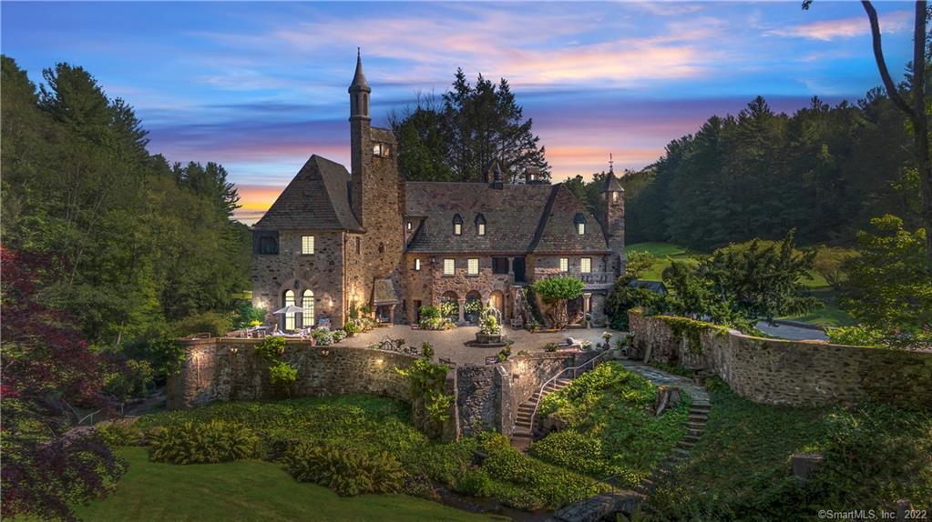 61 Castle Road Cornwall, CT 06796 - Photo 1 of 1 a view of a house with a yard and sitting area