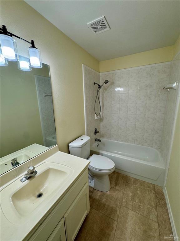 2207 Turtle Court Mission, TX 78572 - Photo 14 of 22 a bathroom with a sink toilet and shower