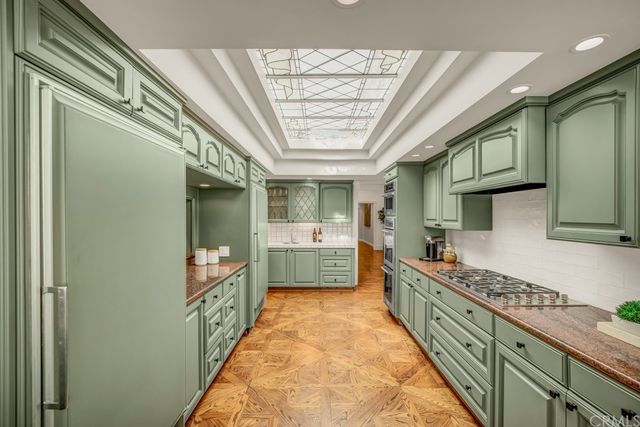 a bathroom with a double vanity sink a mirror and a shower