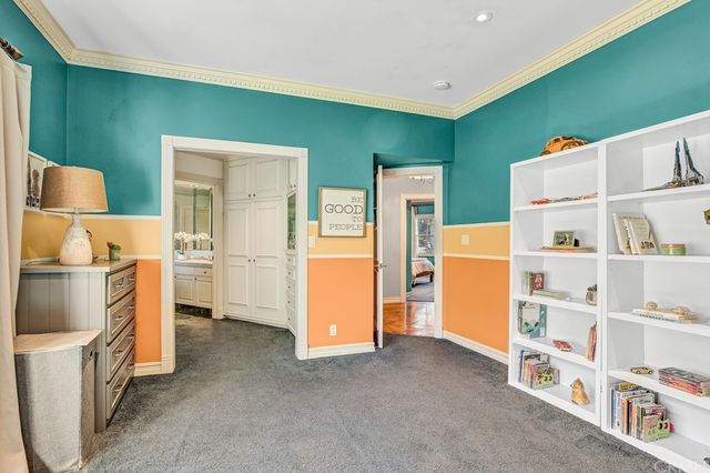 a bathroom with a granite countertop sink mirror and shower