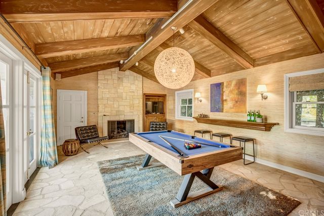 a living room with a table or chairs and a table