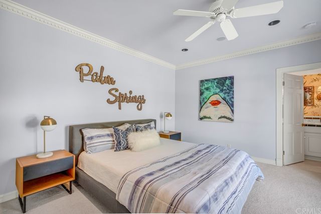 a bedroom with a large bed closet and a window