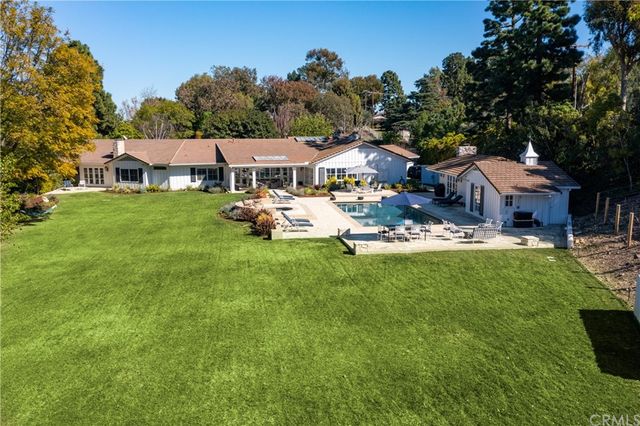 a view of a house with a big yard
