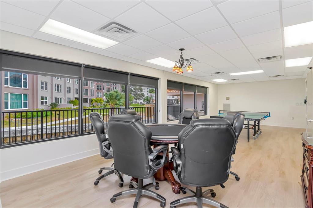 634 Edgewater Drive, Unit 848 Dunedin, FL 34698 - Photo 30 of 40 a view of a dining room with furniture window and outside view