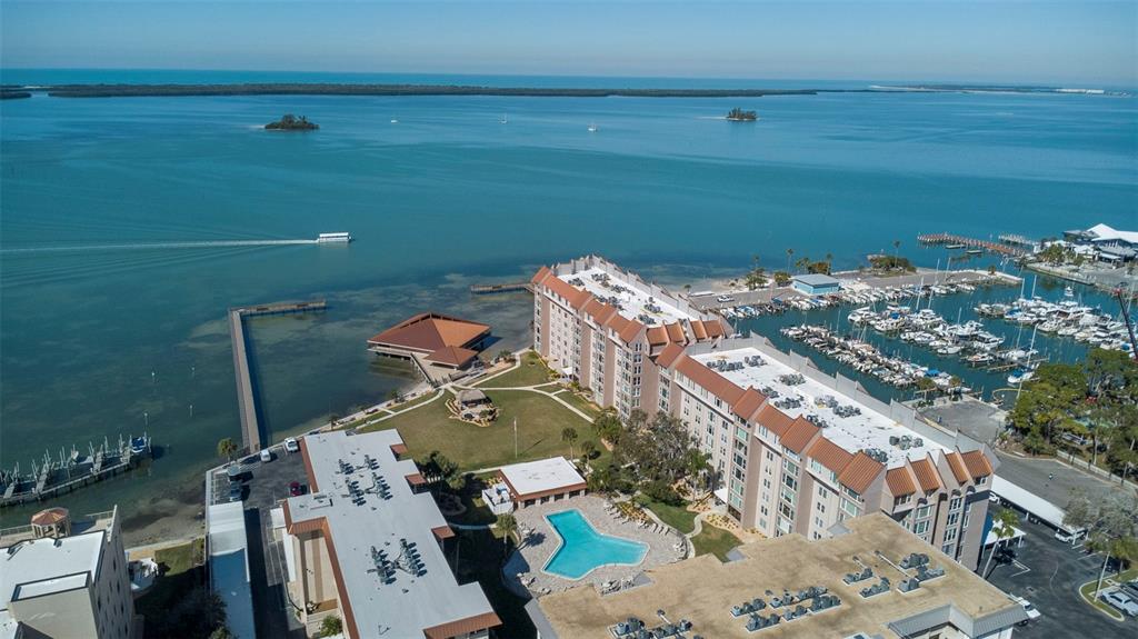 634 Edgewater Drive, Unit 848 Dunedin, FL 34698 - Photo 39 of 40 an aerial view of a house with outdoor space