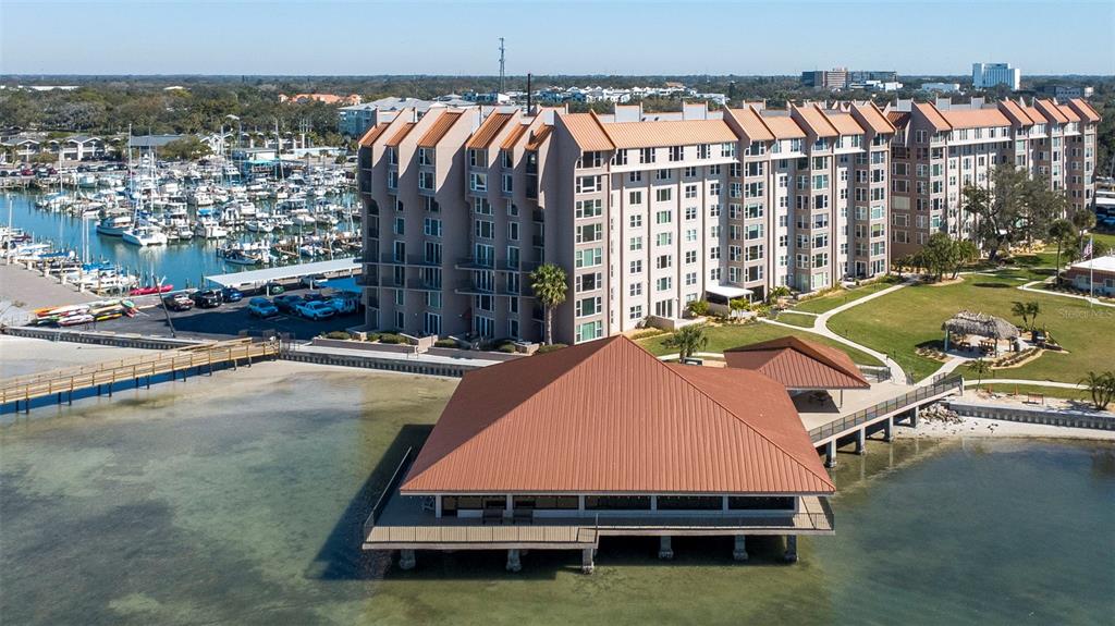 634 Edgewater Drive, Unit 848 Dunedin, FL 34698 - Photo 40 of 40 a room with pool table and chairs