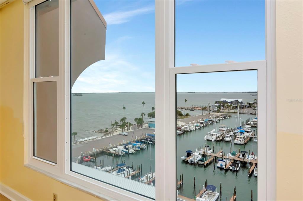 634 Edgewater Drive, Unit 848 Dunedin, FL 34698 - Photo 10 of 40 view of a room with a floor to ceiling window