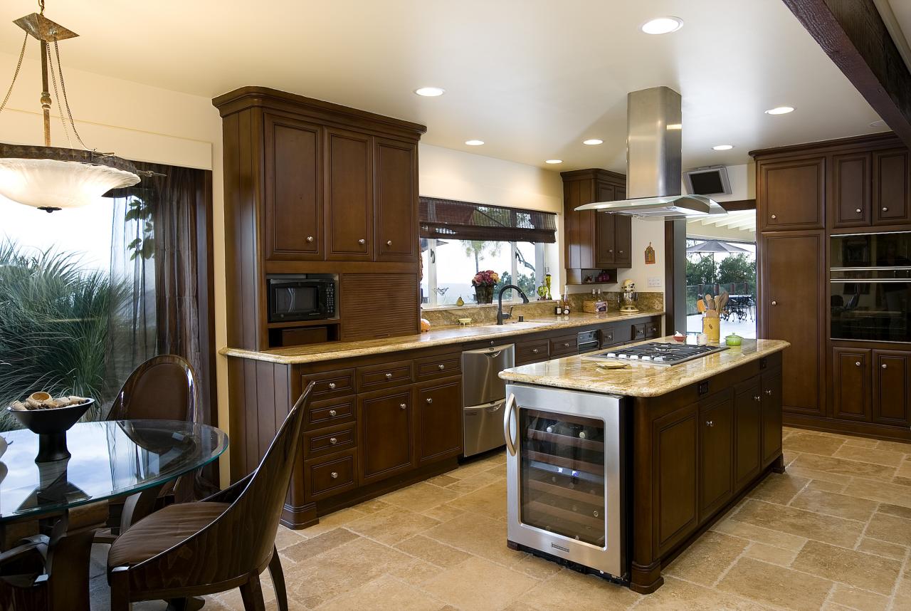 830 Arbolado Road Santa Barbara, CA 93103 - Photo 4 of 6 a kitchen with a sink stove and cabinets