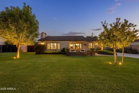a view of a house with a big yard