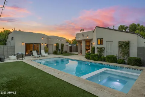 a workspace with furniture and a potted plant
