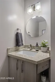 a spacious bedroom with a bed and a window