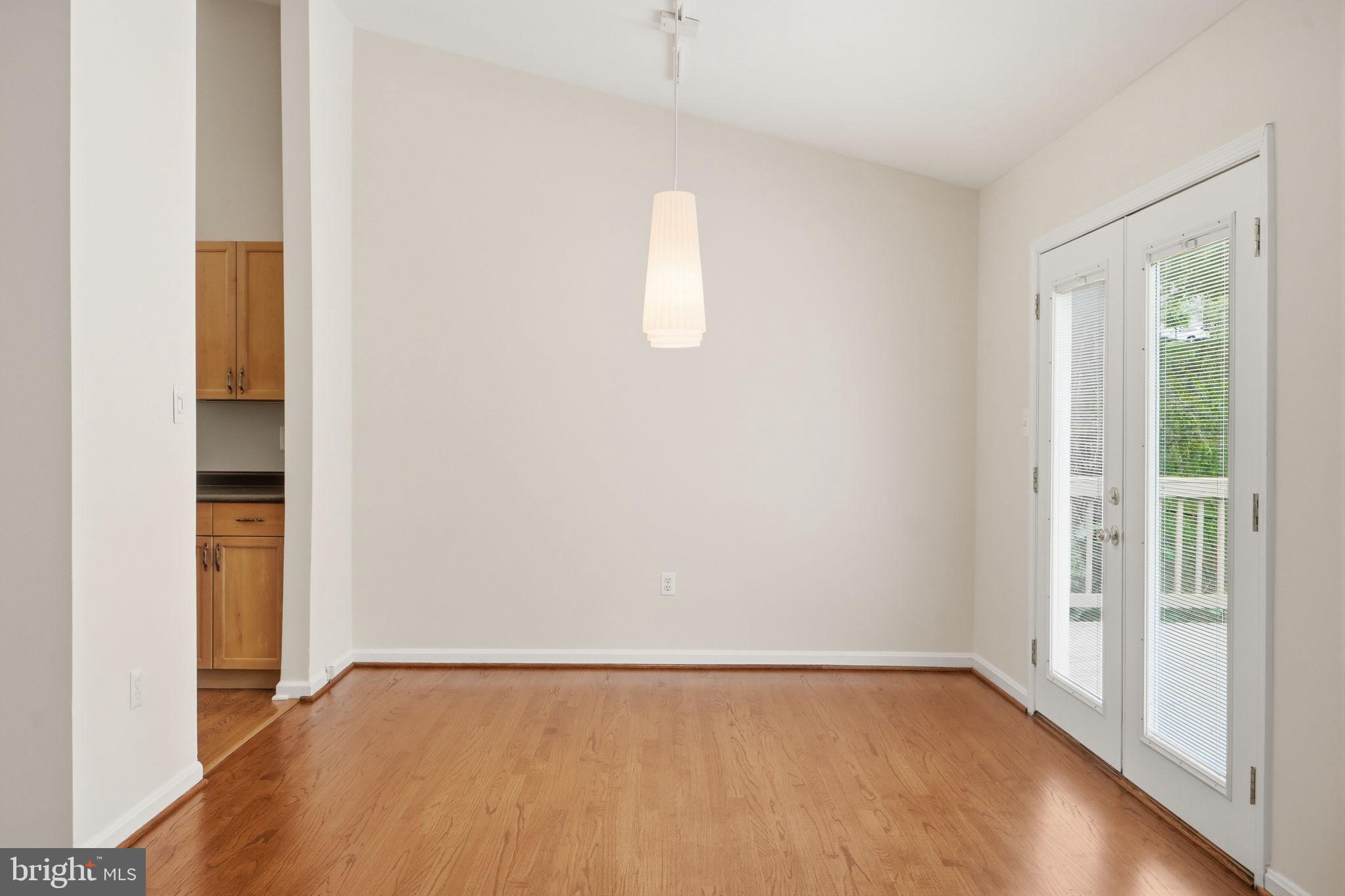 14204 Piccadilly Road Silver Spring, MD 20906 - Photo 10 of 42 Dining Room open to Kitchen and Deck