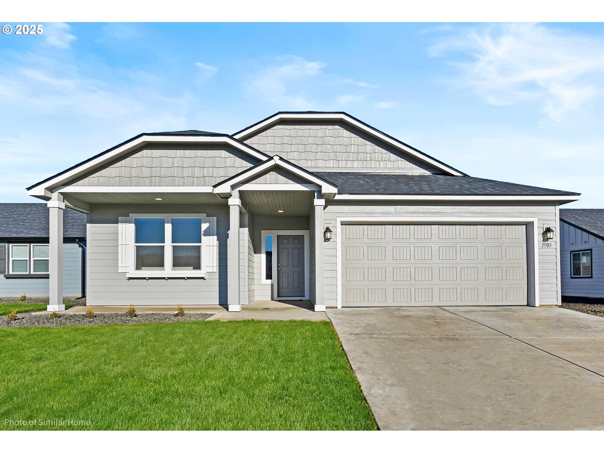 5298 Cedar View Drive Springfield, OR 97478 - Photo 1 of 1 a front view of a house with a garden