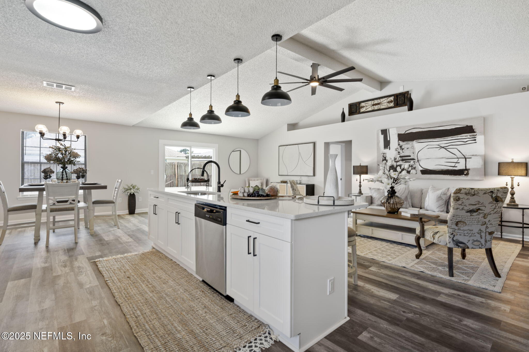2987 Quapaw Trail Middleburg, FL 32068 - Photo 2 of 32 a kitchen with stainless steel appliances granite countertop lots of counter top space