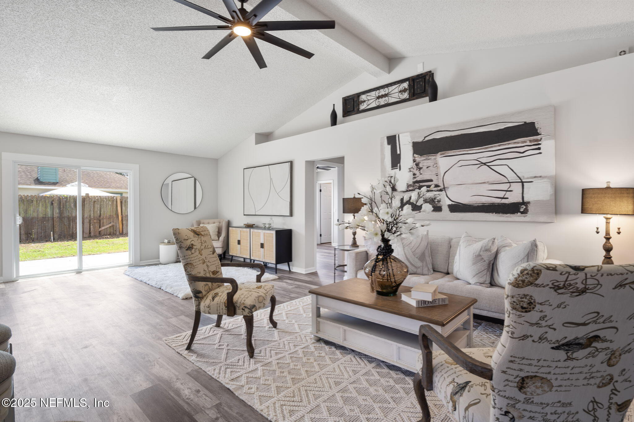 2987 Quapaw Trail Middleburg, FL 32068 - Photo 8 of 32 a living room with furniture and a large window
