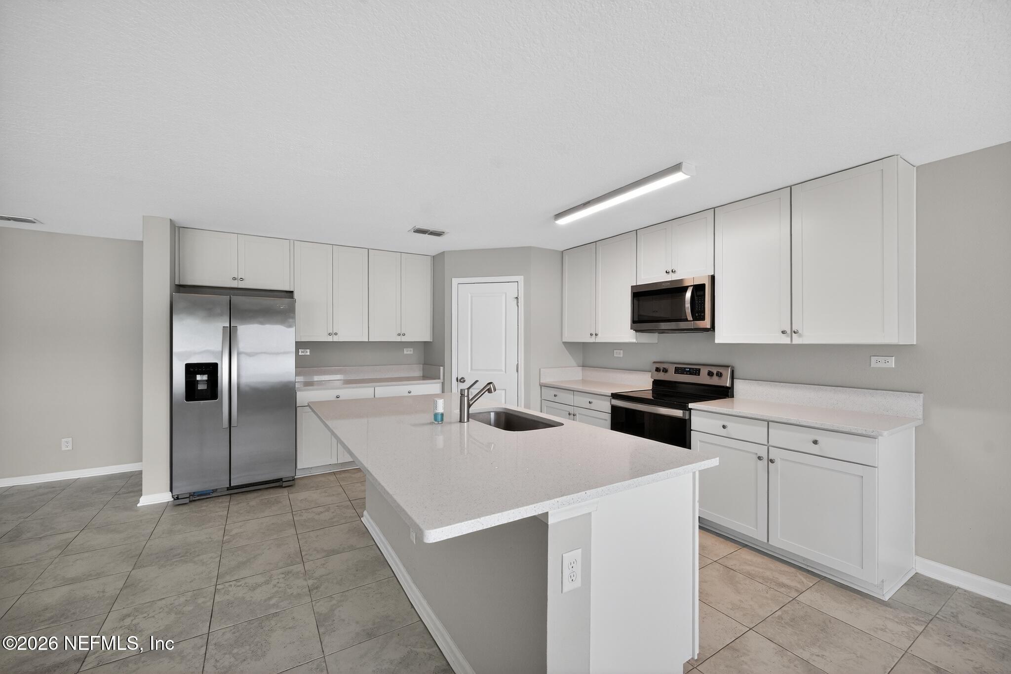 4818 Morning Rise Circle Jacksonville, FL 32218 - Photo 6 of 33 10_4818_Morning_Rise_Cir-Kitchen-8475