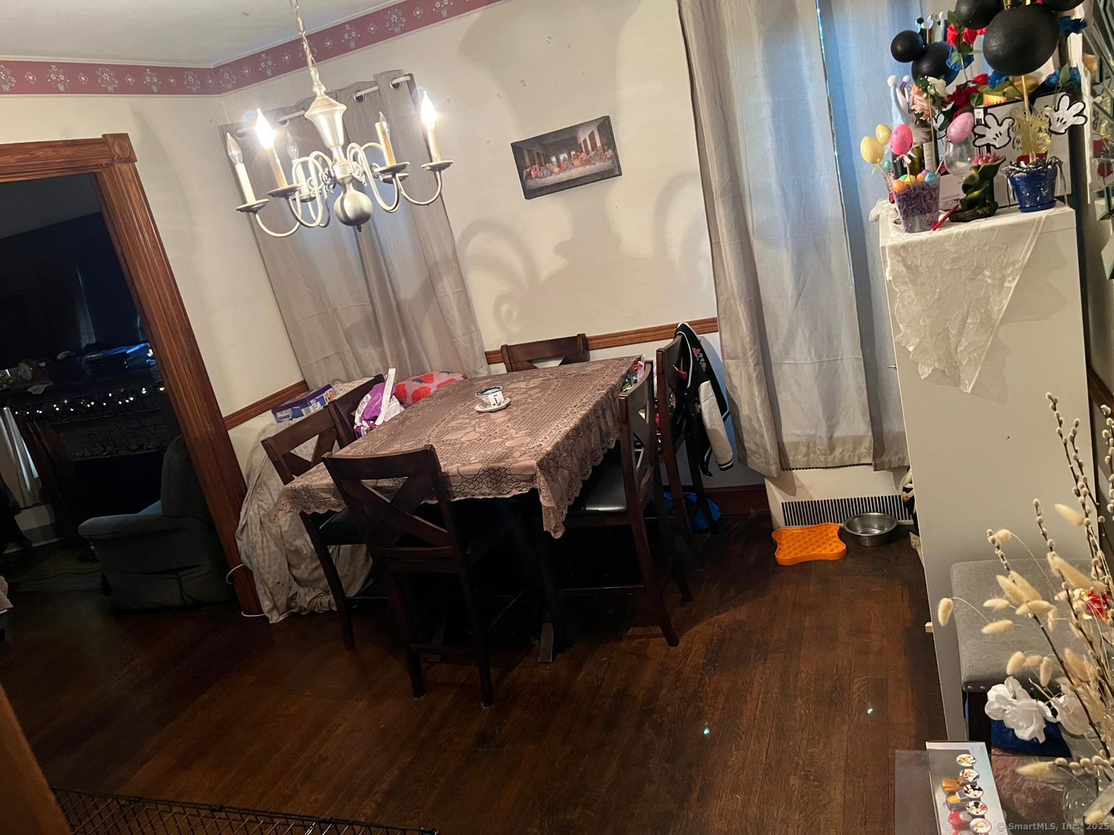 178 Elm Street Meriden, CT 06450 - Photo 9 of 18 a dining room with furniture and wooden floor