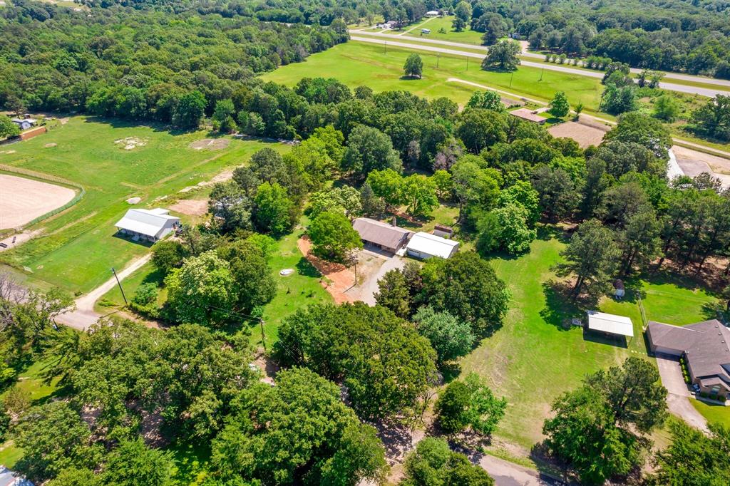 150 County Road Arthur City, TX 75411 - Photo 34 of 37 an aerial view of a residential houses with yard