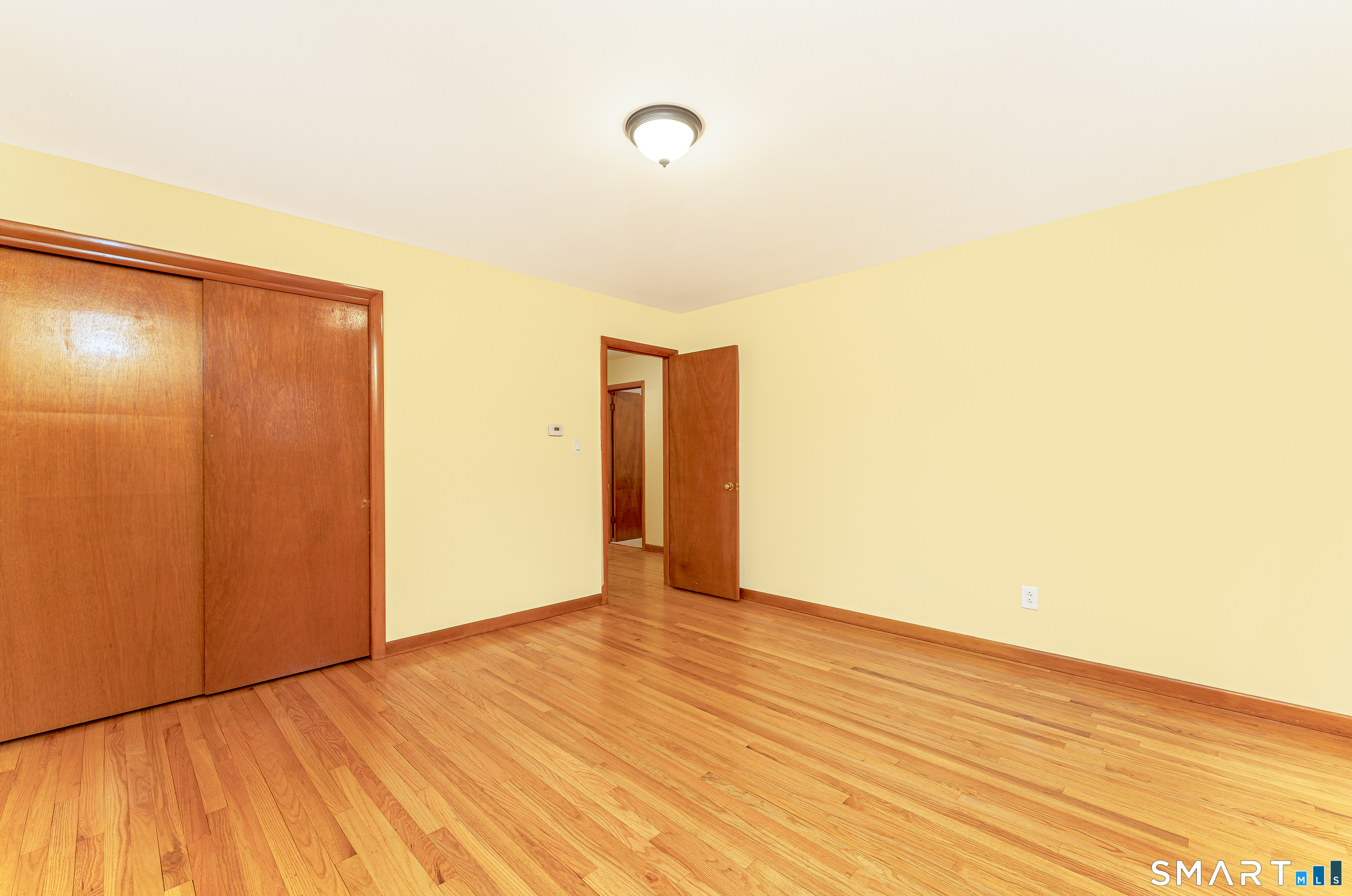 464 French Street Watertown, CT 06779 - Photo 21 of 30 a view of an empty room with wooden floor