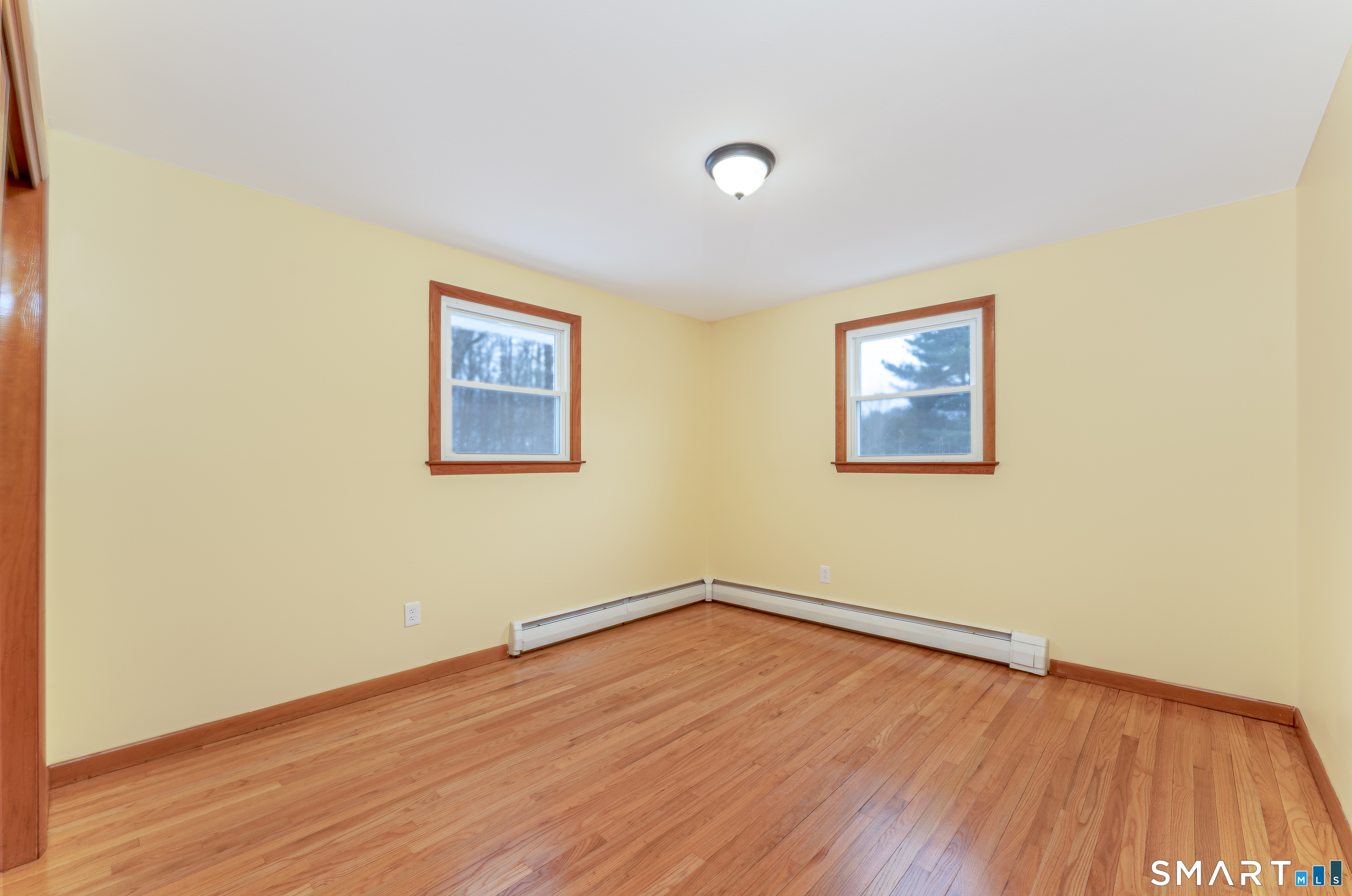 464 French Street Watertown, CT 06779 - Photo 22 of 30 a view of empty room with wooden floor