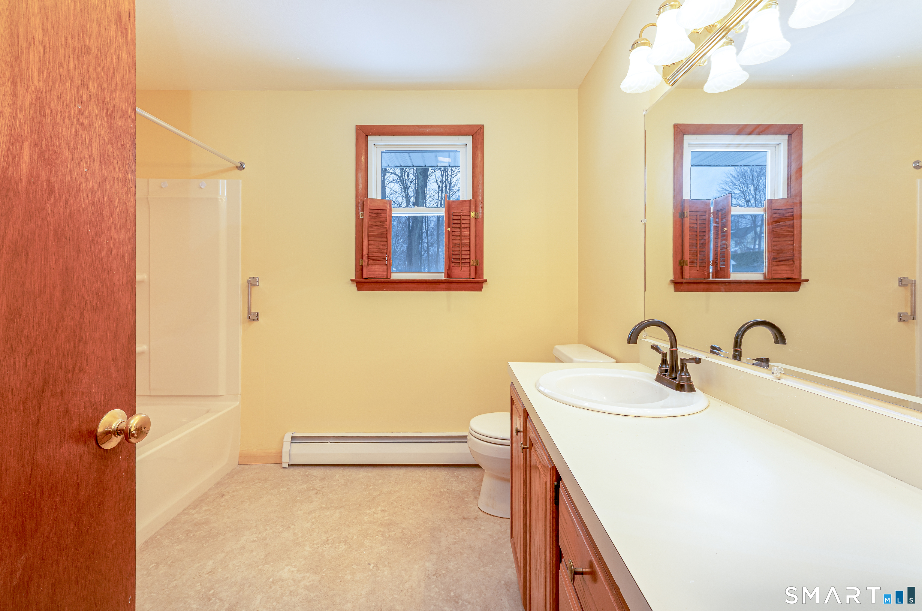 464 French Street Watertown, CT 06779 - Photo 24 of 30 a bathroom with a sink a vanity and a mirror