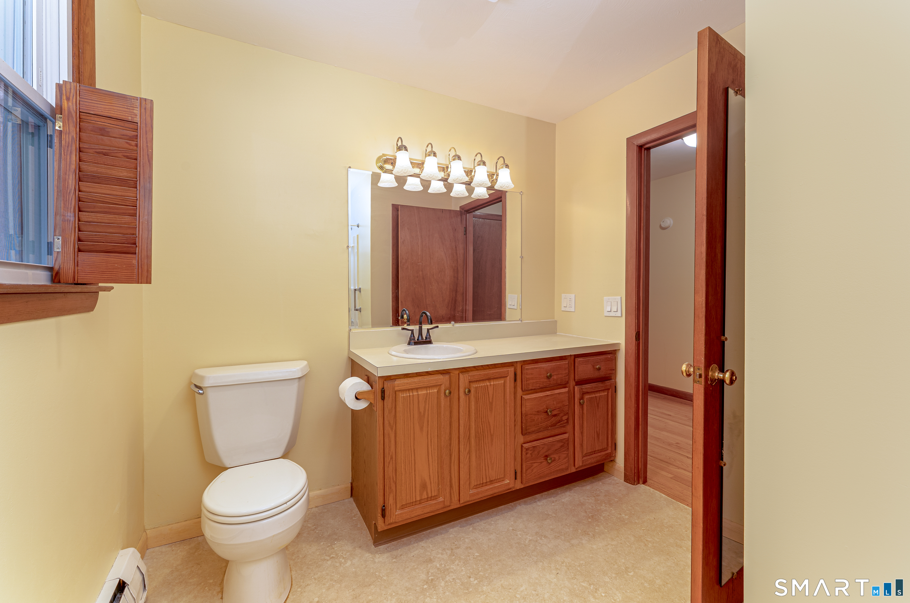464 French Street Watertown, CT 06779 - Photo 25 of 30 a bathroom with a toilet sink and mirror