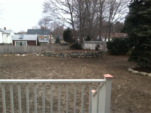11 Tufts Road, Unit 11 Winchester, MA 01890 - Photo 2 of 3 a view of a house with a yard