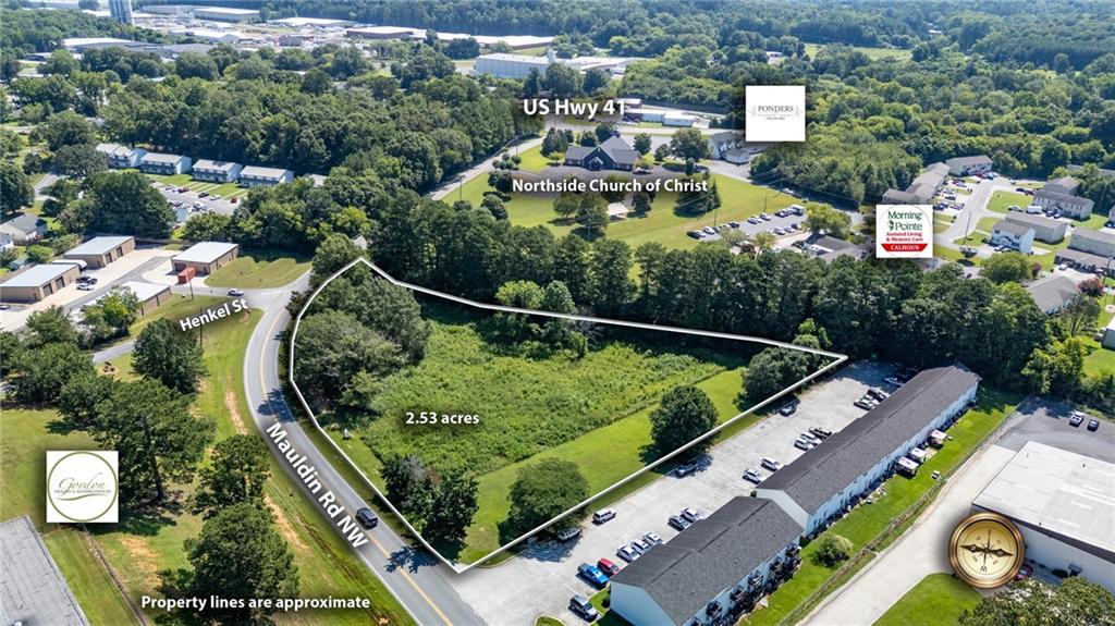 an aerial view of a house with a garden