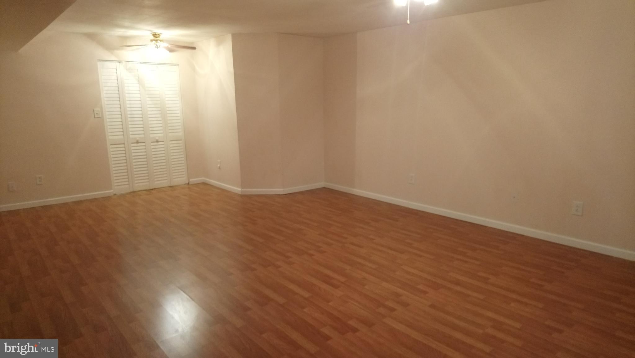 8795 Lowell Road Pomfret, MD 20675 - Photo 29 of 65 Lower level family/rec room