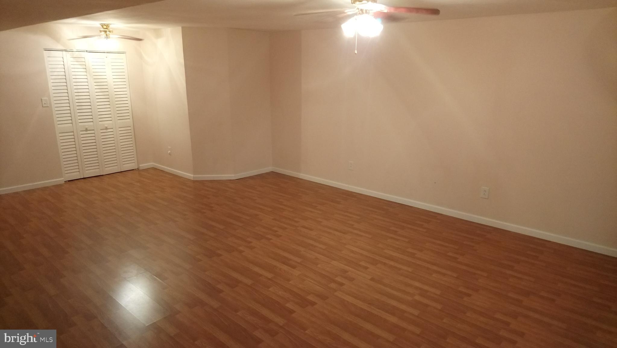8795 Lowell Road Pomfret, MD 20675 - Photo 34 of 65 Lower level family/rec room