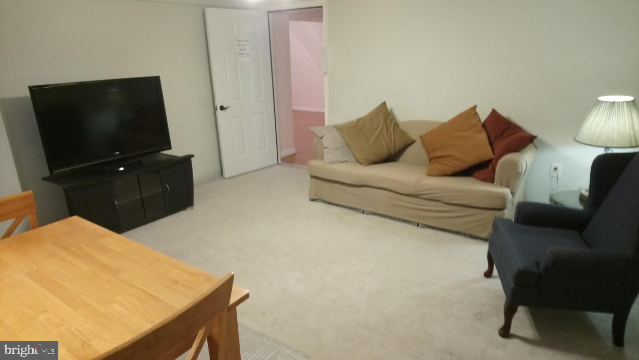 8795 Lowell Road Pomfret, MD 20675 - Photo 38 of 65 In-law suite living area or den