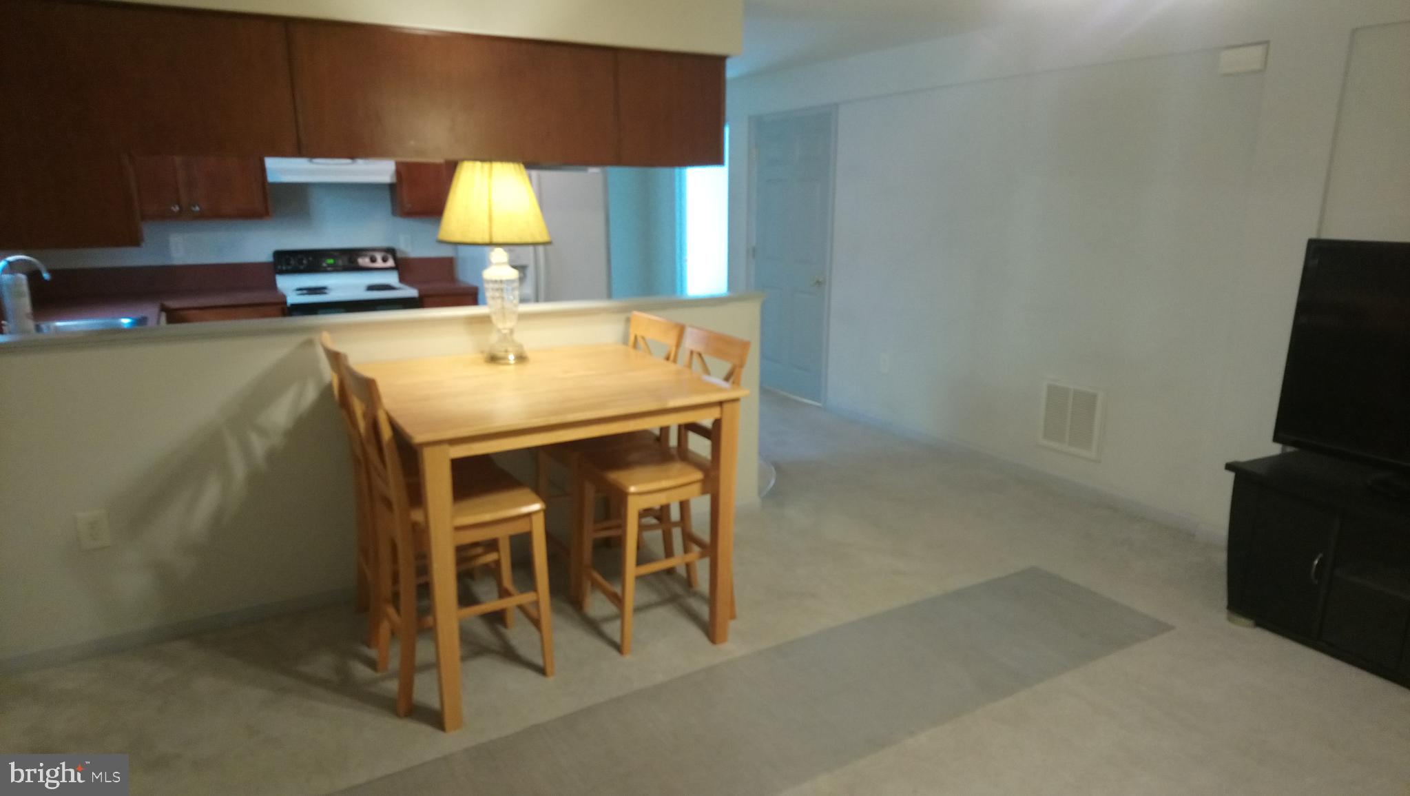 8795 Lowell Road Pomfret, MD 20675 - Photo 39 of 65 In-law suite dining