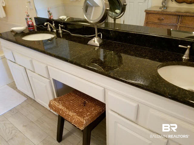 28875 Perdido Beach Boulevard, Unit 1A Orange Beach, AL 36561 - Photo 9 of 25 Master bedroom features double vanity and ample room for make-up area between