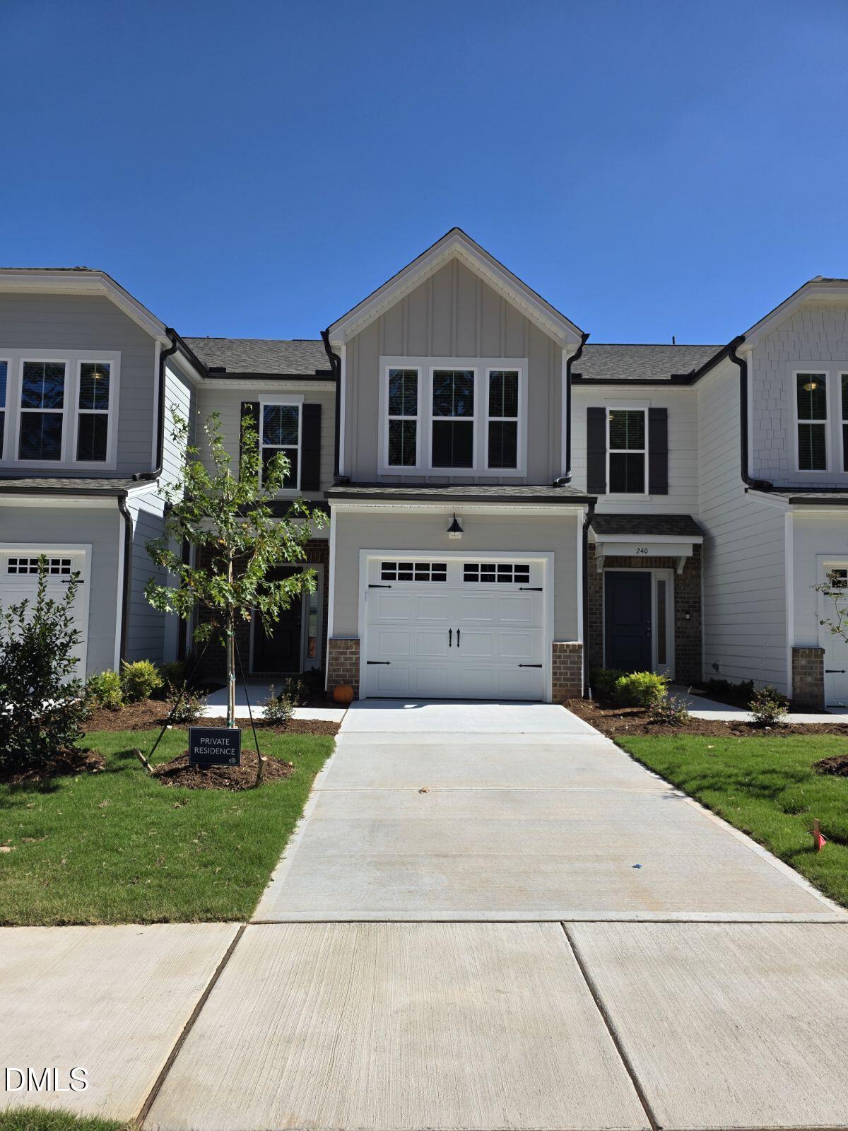 a house view with a garden space