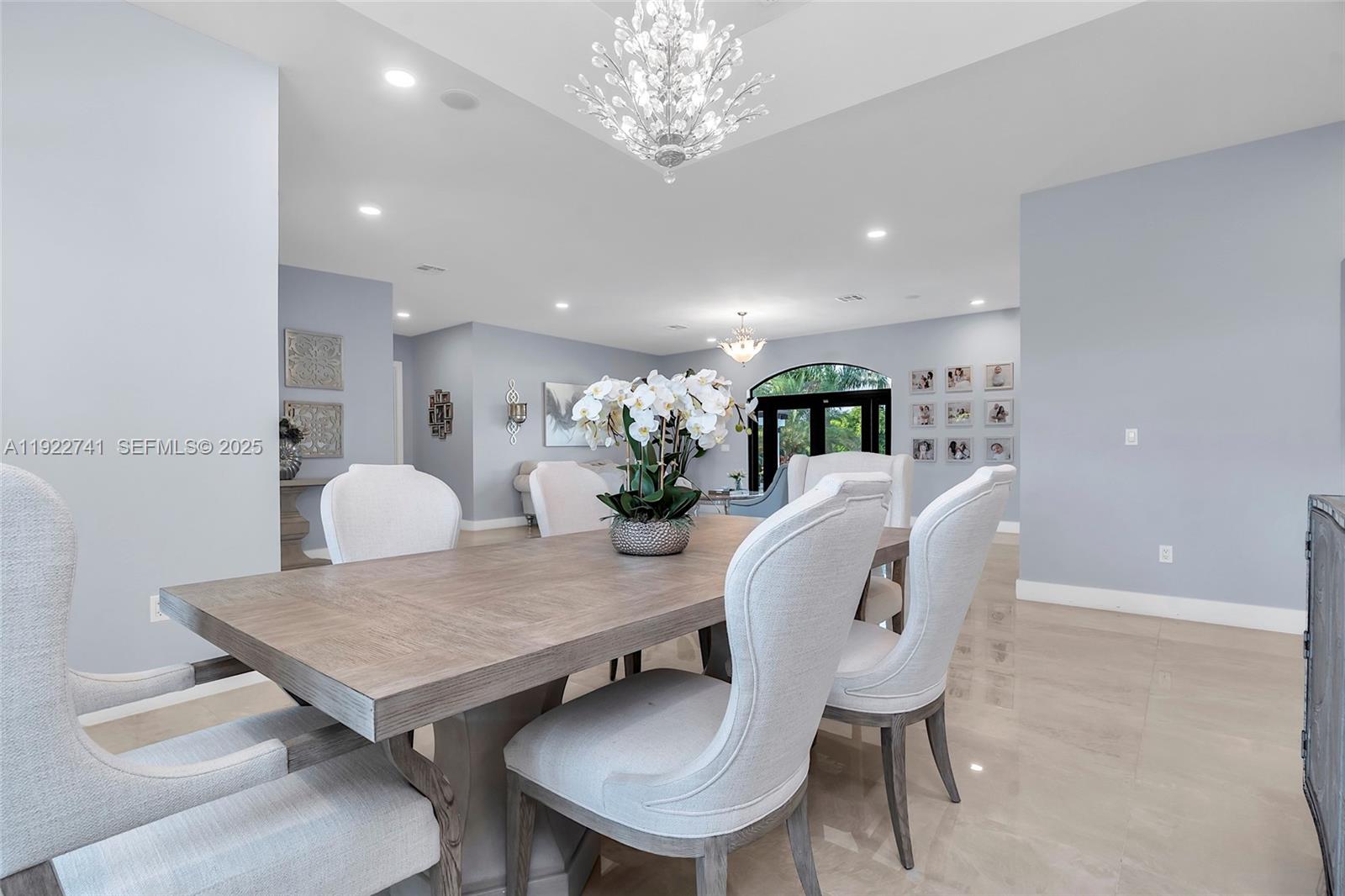 15701 Southwest 254th Street Homestead, FL 33031 - Photo 11 of 50 a view of a dining room with furniture