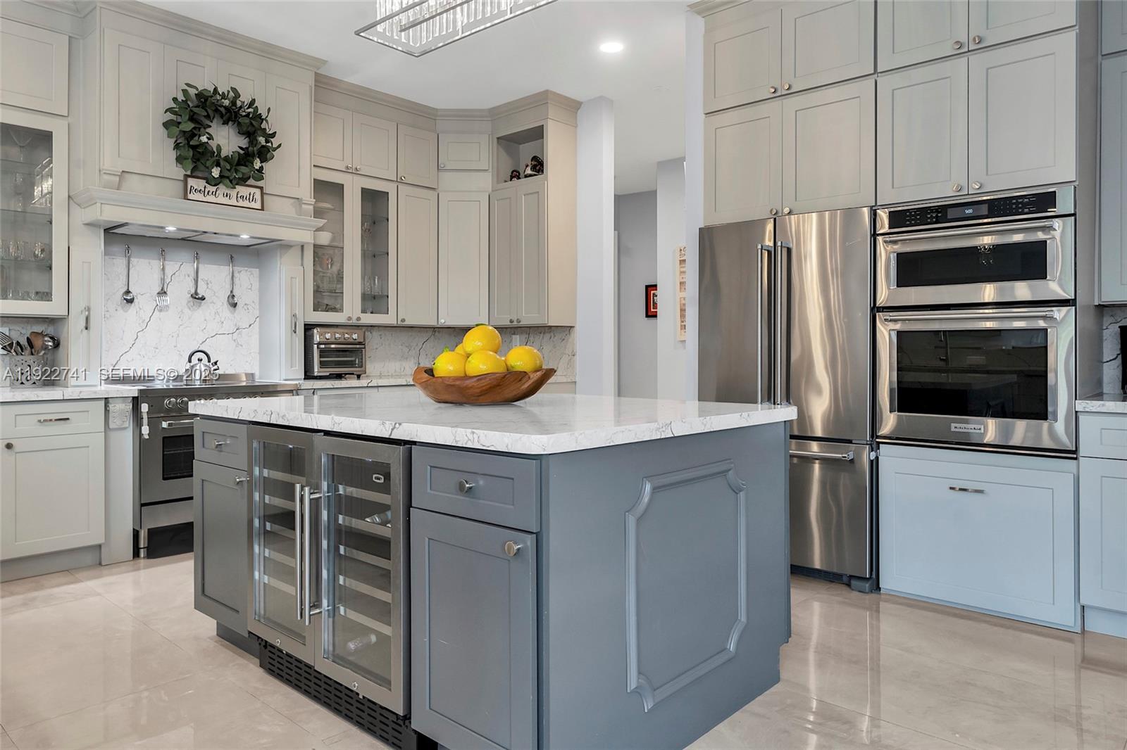 15701 Southwest 254th Street Homestead, FL 33031 - Photo 16 of 50 a kitchen with a sink appliances and cabinets